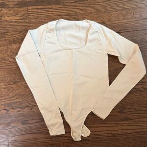 SKIMS Cream Long Sleeve Bodysuit